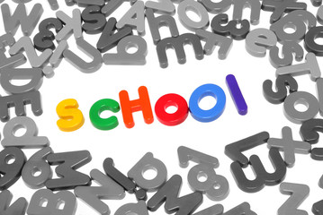 Colorful letters spelling out school over white