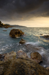 Rocky seascape in Greece, during a windy afternoon