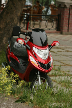 close-up of red motorcycle (motorbike)