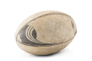 Rolgordijnen Bol A well used and worn rugby ball. 