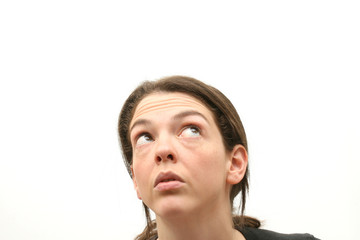 Obraz premium Thinking woman. Isolated over white