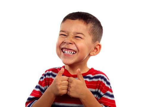 Boy giving thumbs up and funny smile