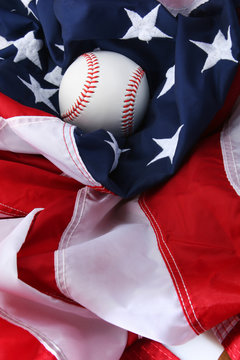 baseball lying on the us flag, great background