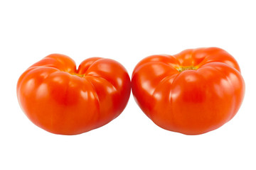 the two red tomatoes isolated on white background