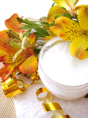cosmetic moisturizing cream with flowers