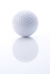 Golf ball with reflection on white and grey background