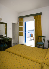 greek island hotel suite room with view of beach 