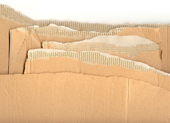 Ripped pieces of corrugated cardboard