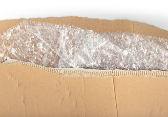 Ripped pieces of corrugated cardboard and bubblewrap 
