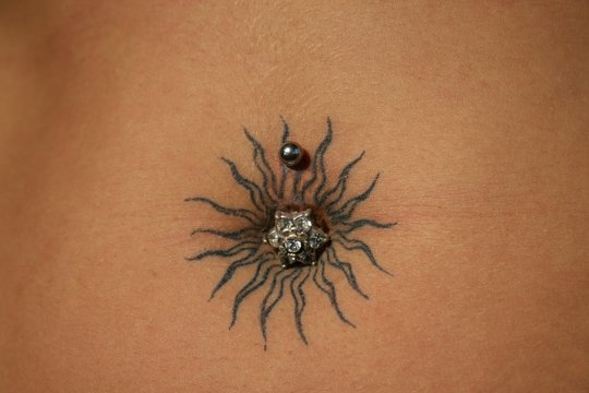 pircing m tatoo