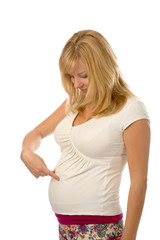 Fototapeta premium the young pregnant woman on white background