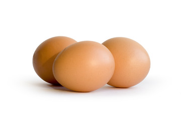 Three eggs on white background