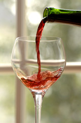 pouring red wine
