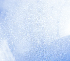 High contrast small bubbles. Blue tint.