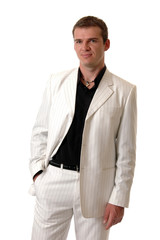 A stylish businessman in a white suit
