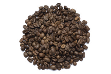 Coffee beans spilled onto a white background