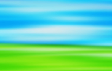 Abstract blur background of a landscape of sky and grass