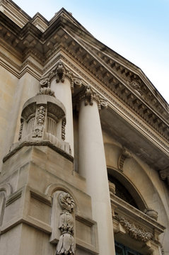 Neo-Classical building exterior with ionic columns.
