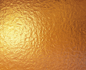 a very large sheet of fine crinkled gold aluminium foil