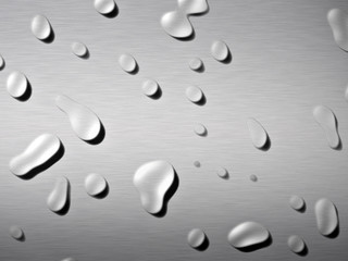 a large sheet of brushed metal with water drops splashed on it
