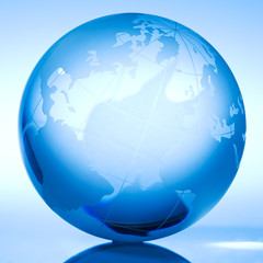 Fototapeta premium Blue globe with backlit light
