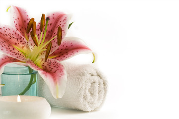 spa feeling (flower, candles and towel). White background.