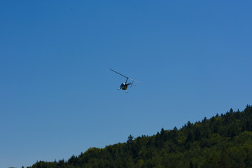 Helicopter in acrobations during airshow