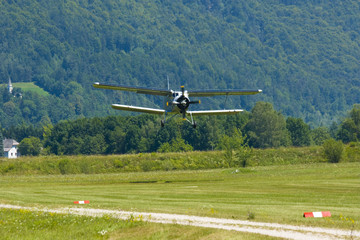 Fototapeta premium Biplane An-2 (Antonov) in the airshow