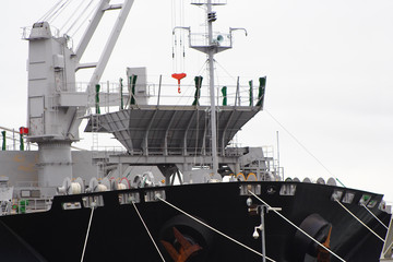 Fototapeta premium Large cargo ship docked at port