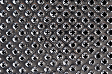 macro shot of the grater surface on black background