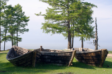 old wooden fishing boats on the Baikal lakeside