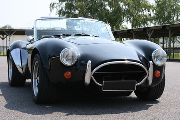 Front of classic black sports car
