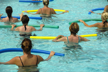 Wemen doing water aerobic in pool - 3899465