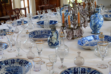 The blue dinner service with a candlestick