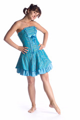 dancing girl in blue dress isolated on white background