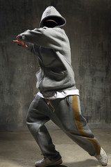 Nightclub dancer posing on a dark background
