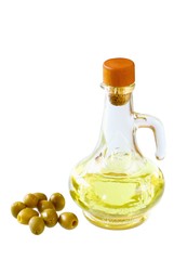 Extra-virgin olive oil and greens olives  on white background