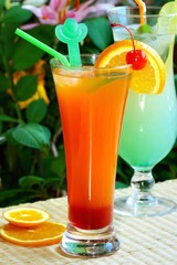 Summer alcoholic recreational drink with cherry and lemon