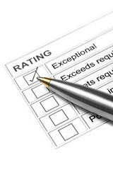 Gold and silver ballpoint marking an "exceptional"  rating.