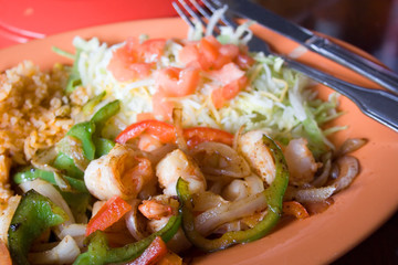 Shrimp Fajita Dinner with Rice and Salad at a Mexican Restaurant
