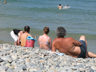 bain de Soleil à la plage de Palus