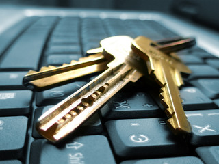 golden keys on keyboard of laptop