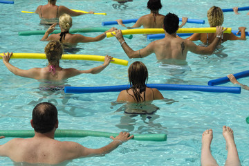 People doing water aerobic in pool