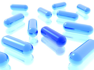 3D rendered blue pills. Health care concept