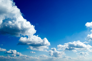 Naklejka na ściany i meble The beautiful white clouds on background blue sky.