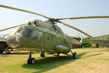 Fototapeta na wymiar Old military helicopter Mi-8