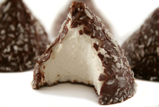 Chocolate and coconut covered marshmallow cones 
