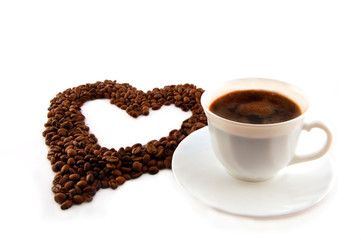 cup of coffee with heart of coffee beans..