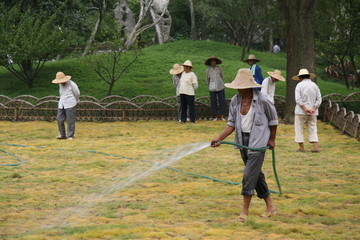 Chinese workers with straw hats in Suzhou