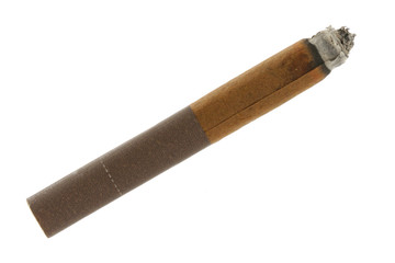 Burned-out little cigar isolated over a white background